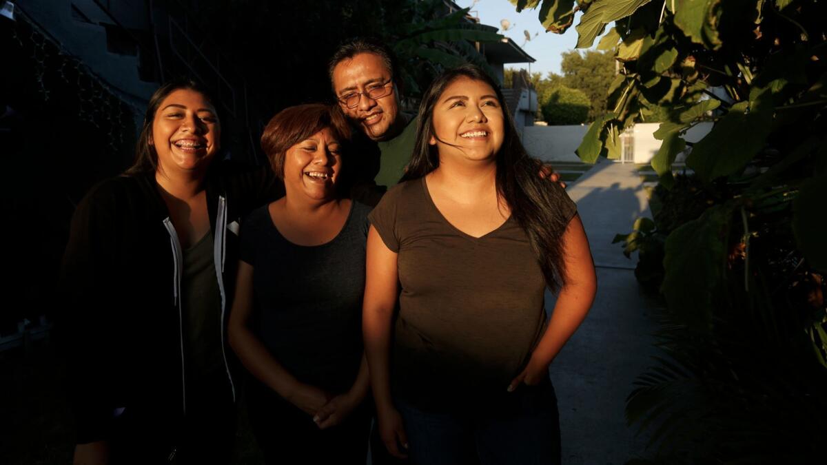 Diana Martinez, left, her parents Bertha Martinez and Victor Soriano, along with sister Brenda Soriano spend a warm moment together.