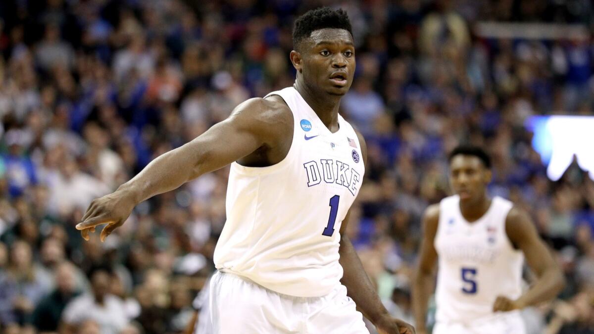 Freshman Zion Williamson and top-seeded Duke reached the Elite Eight of the NCAA tournament, where they lost to Michigan State.