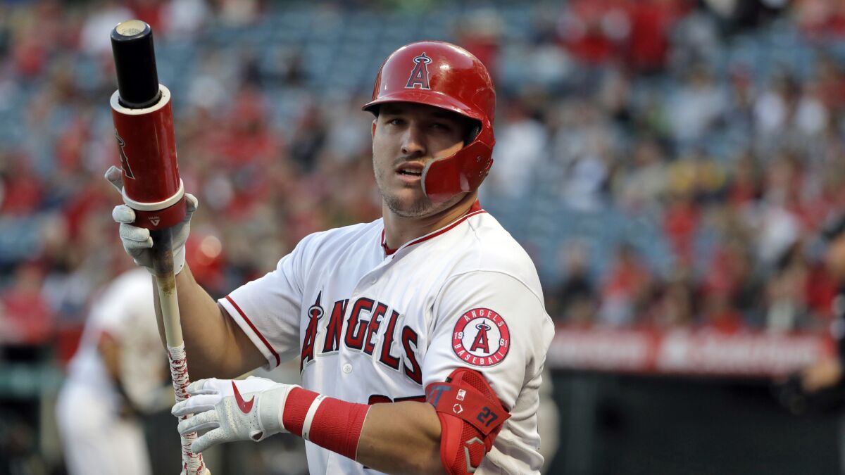 Angels center fielder Mike Trout warms up before an at-bat against the Oakland Athletics on June 5. Trout's hitting numbers continue to improve with each season.