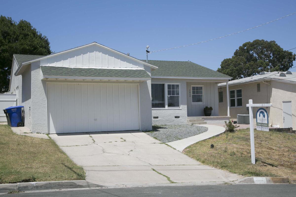 The median home price in San Diego County is now $600,000. Pictured: A house for sale last summer in La Mesa for $500,000.