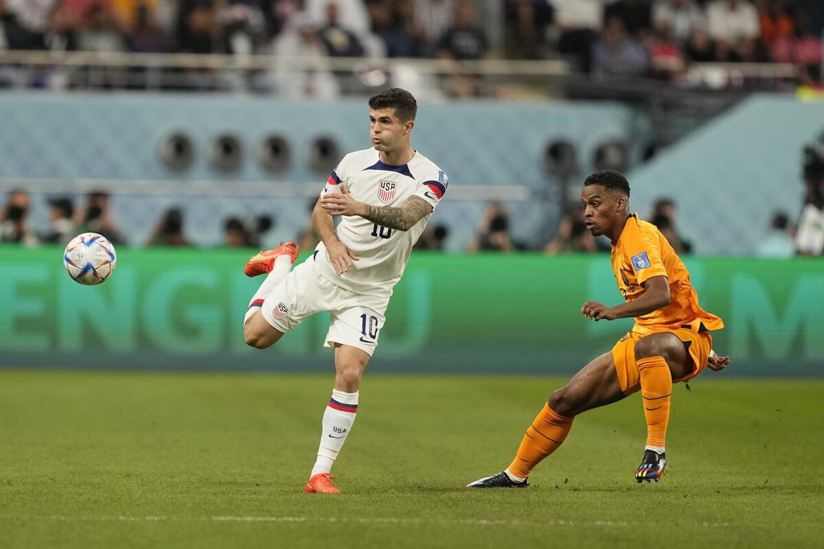 U.S. forward Christian Pulisic makes a pass early in the game against the Netherlands.