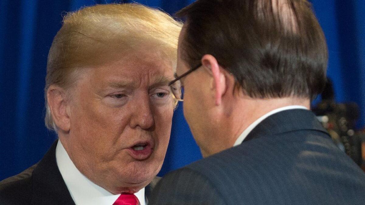 President Trump greets Rod Rosenstein, the deputy attorney general, before a roundtable discussion on immigrant gang violence in Bethpage, N.Y., on Wednesday.