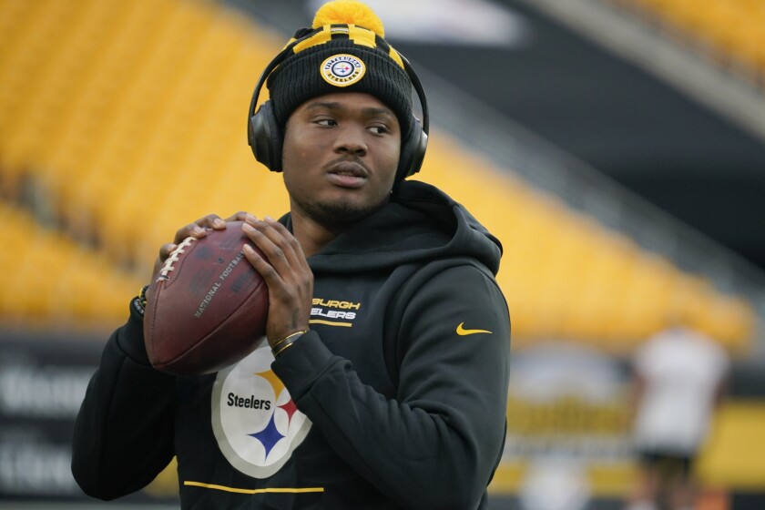 FILE - Pittsburgh Steelers quarterback Dwayne Haskins warms up before an NFL football game.