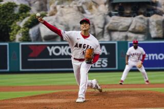 Los Angeles Angels starting pitcher Shohei Ohtani throws to a San Francisco Giants batter during a baseball game Wednesday, Aug. 9, 2023, in Anaheim, Calif. (AP Photo/Ryan Sun)
