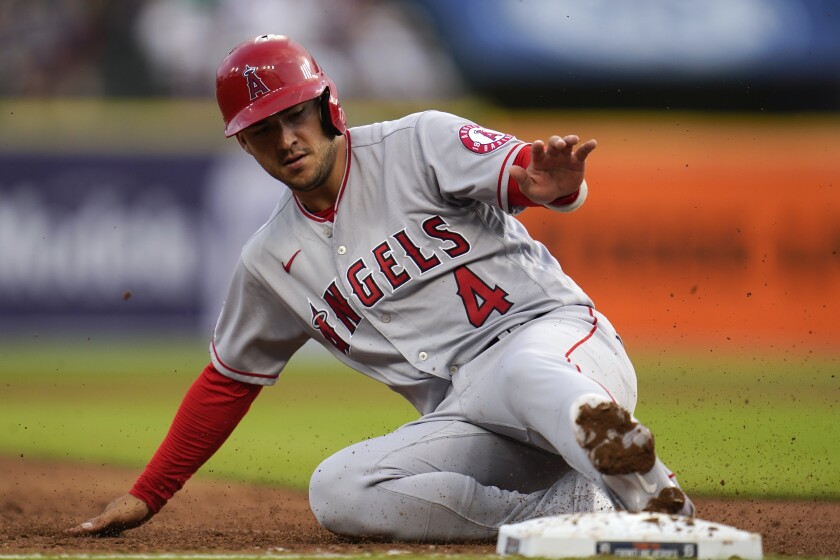 Shortstop José Iglesias slides into a base during a game.