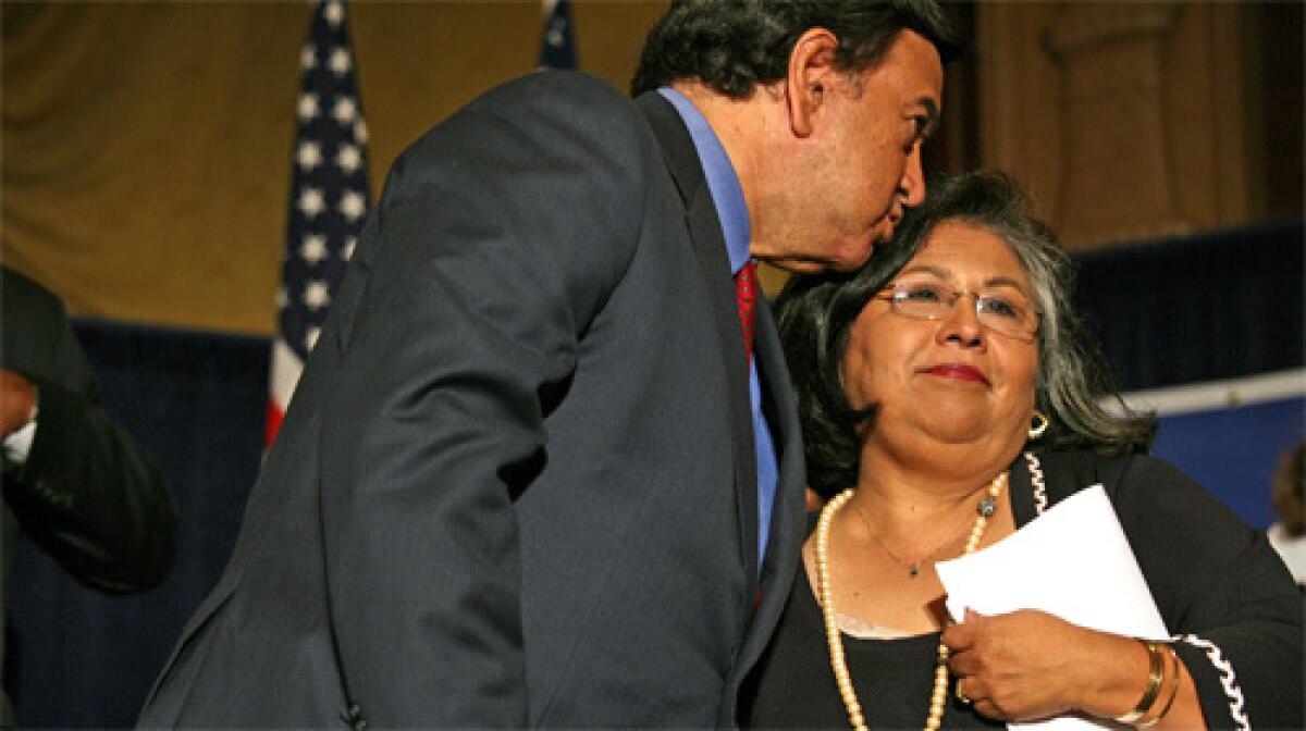 New Mexico Governor Bill Richardson, left, kisses longtime friend and supporter Los Angeles Country Supervisor Gloria Molina.