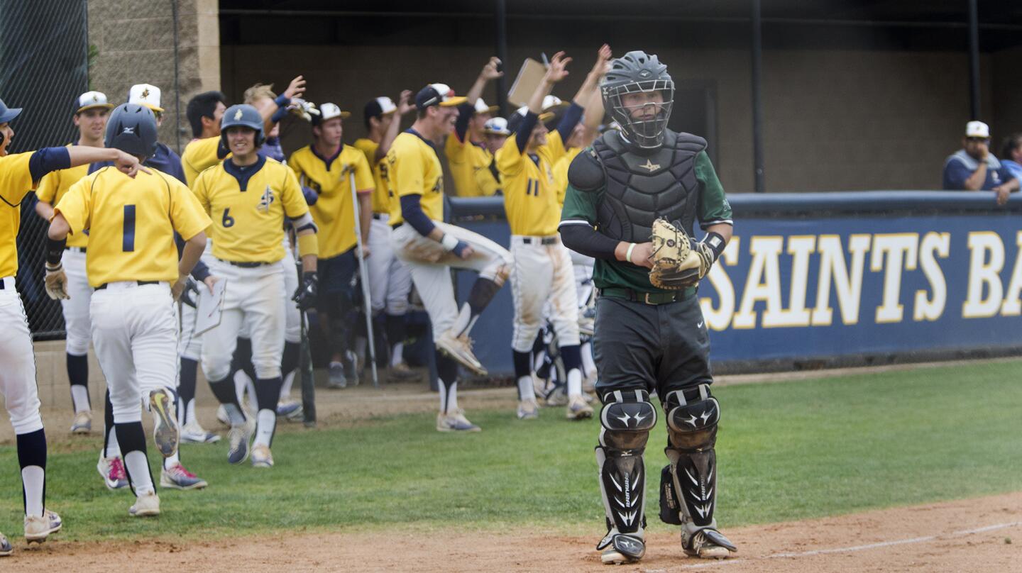 Sage Hill School catcher Conner Hatz looks on after Crean Lutheran goes up 2-0 in the bottom of the sixth inning during an Academy League game in Irvine on Tuesday. (Kevin Chang/ Daily Pilot)