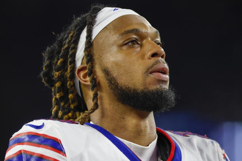 Buffalo Bills defensive back Damar Hamlin (3) leaves the field after an NFL football game against the New England Patriots