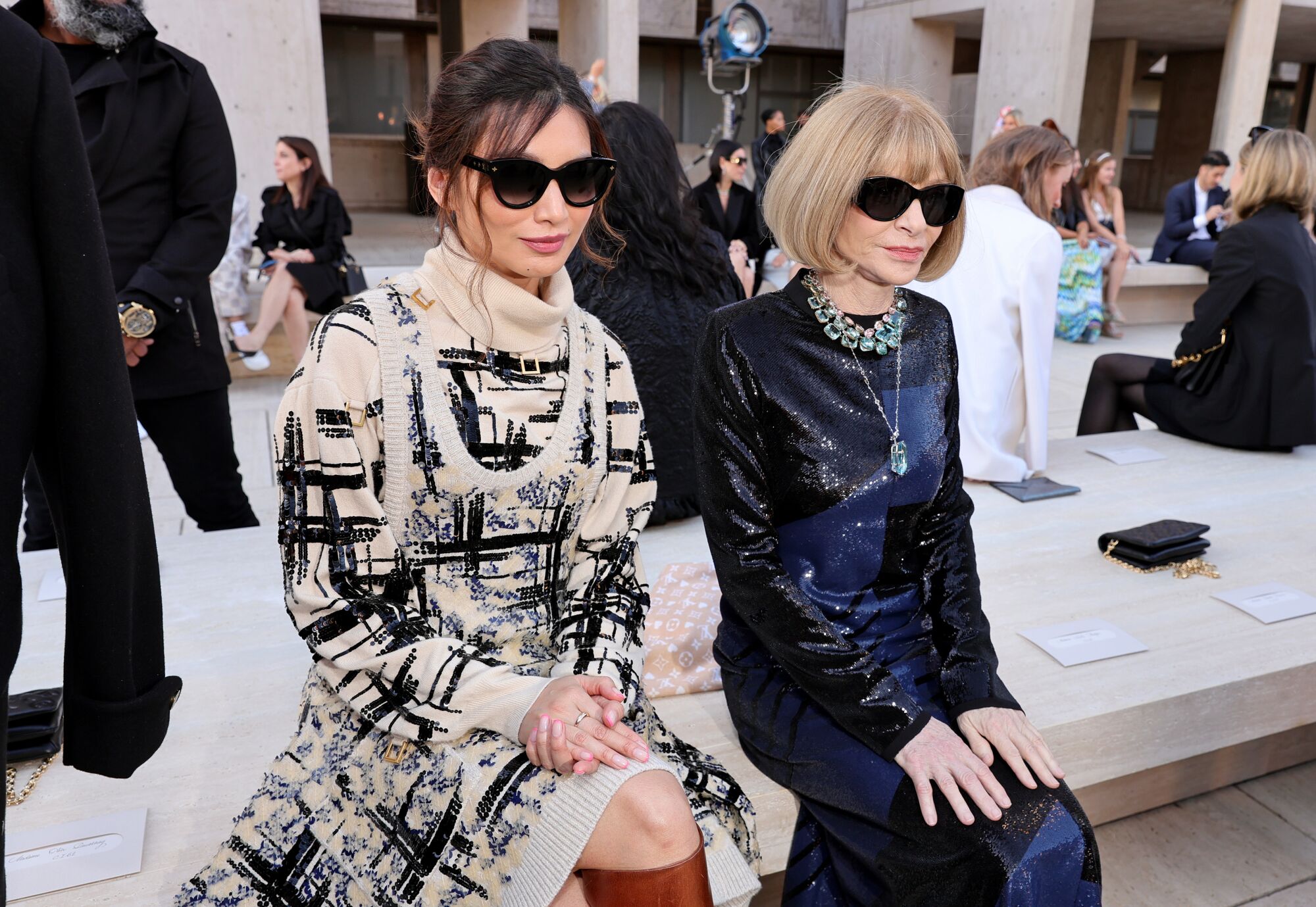Gemma Chan and Anna Wintour attend Louis Vuitton's 2023 Cruise show on May 12, 2022, at the Salk Institute.
