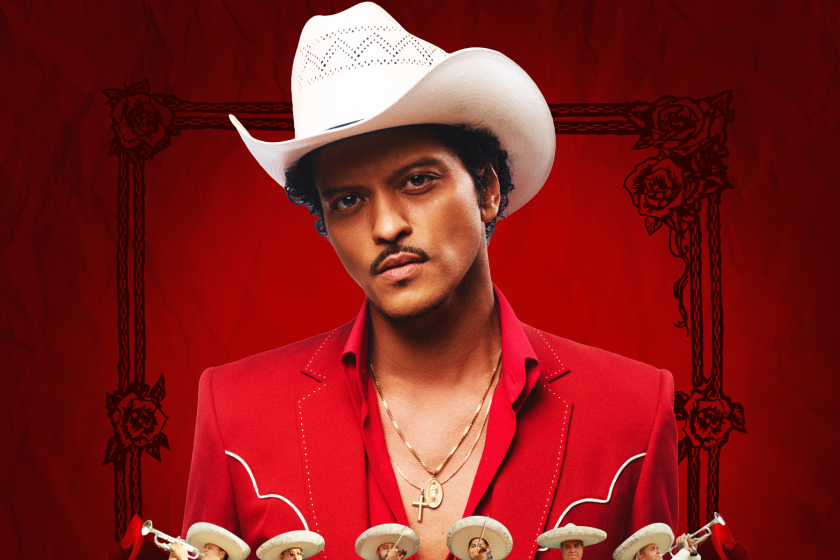 Bruno Mars with Mariachis and roses.