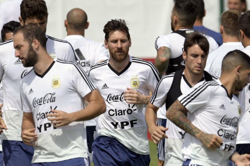 Argentina's forward Lionel Messi (C) attends a training session at the team's base camp in Bronnitsy, near Moscow, Russia on June 24, 2018 ahead of the Russia 2018 World Cup Group D football match against Nigeria to be held in Saint Petersbourg on June 26. Messi who is born on June 24, 1987, turns 31 today. / AFP PHOTO / JUAN MABROMATAJUAN MABROMATA/AFP/Getty Images ** OUTS - ELSENT, FPG, CM - OUTS * NM, PH, VA if sourced by CT, LA or MoD **