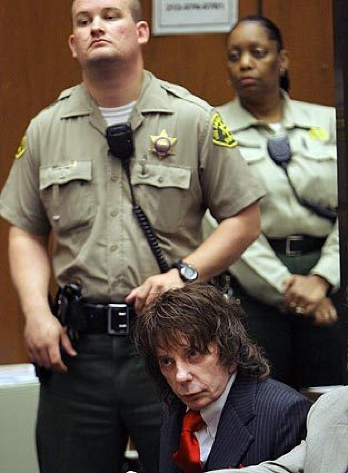 Music producer Phil Spector appears in court Friday to hear his sentence: 19 years to life in prison. Spector, 69, was convicted last month of second-degree murder in the death of actress Lana Clarkson, 40, who was shot in his Alhambra mansion.