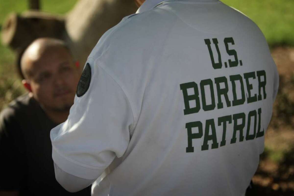 Border Patrol agents detain two men near the Calexico border crossing who admitted to affiliations with the L.A.-based Sureño gang.