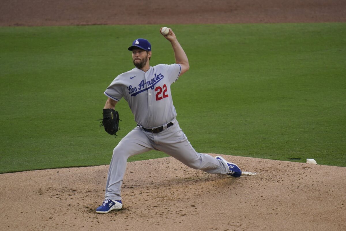 Los Angeles Dodgers starting pitcher Clayton Kershaw works against a San Diego Padres.
