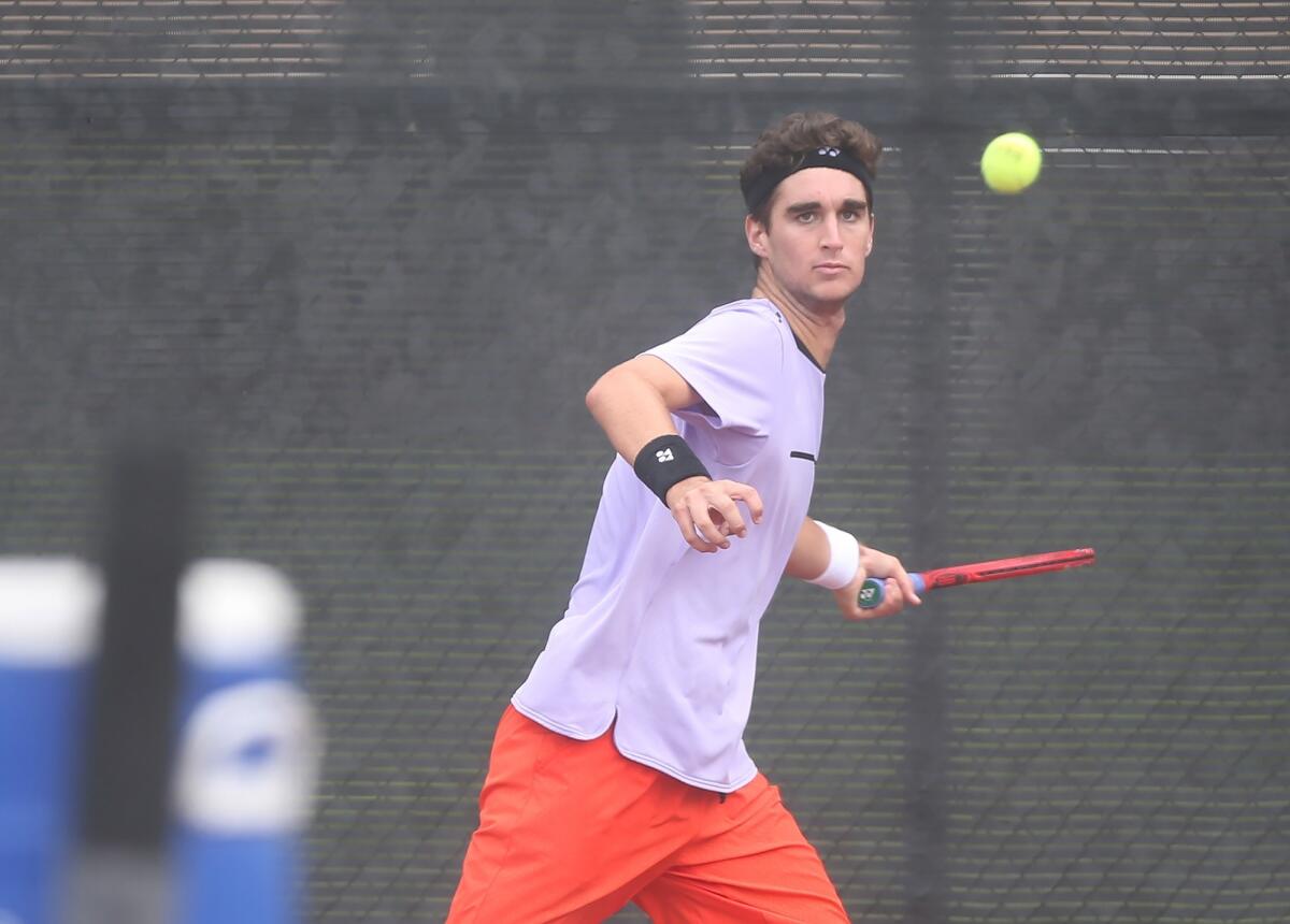 Top-seeded Max McKennon eyes a forehand in the 18-and-under singles match against Tyler Davis of Redlands in the round of 16 at the USTA Southern California Junior Sectional Championships at Costa Mesa Tennis Center on Friday.