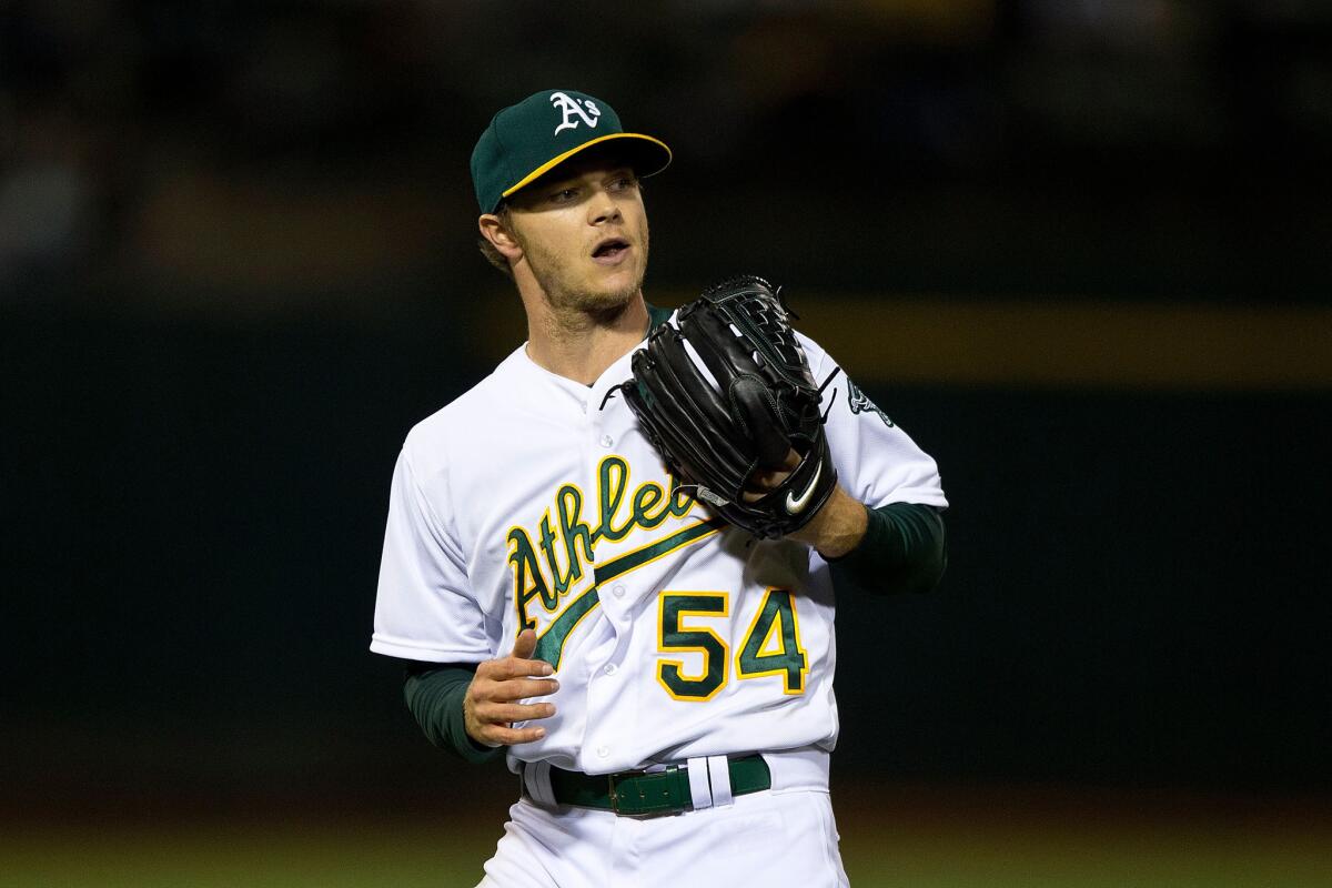 Athletics pitcher Sonny Gray celebrates after throwing a complete game in a 3-1 victory over the Astros.