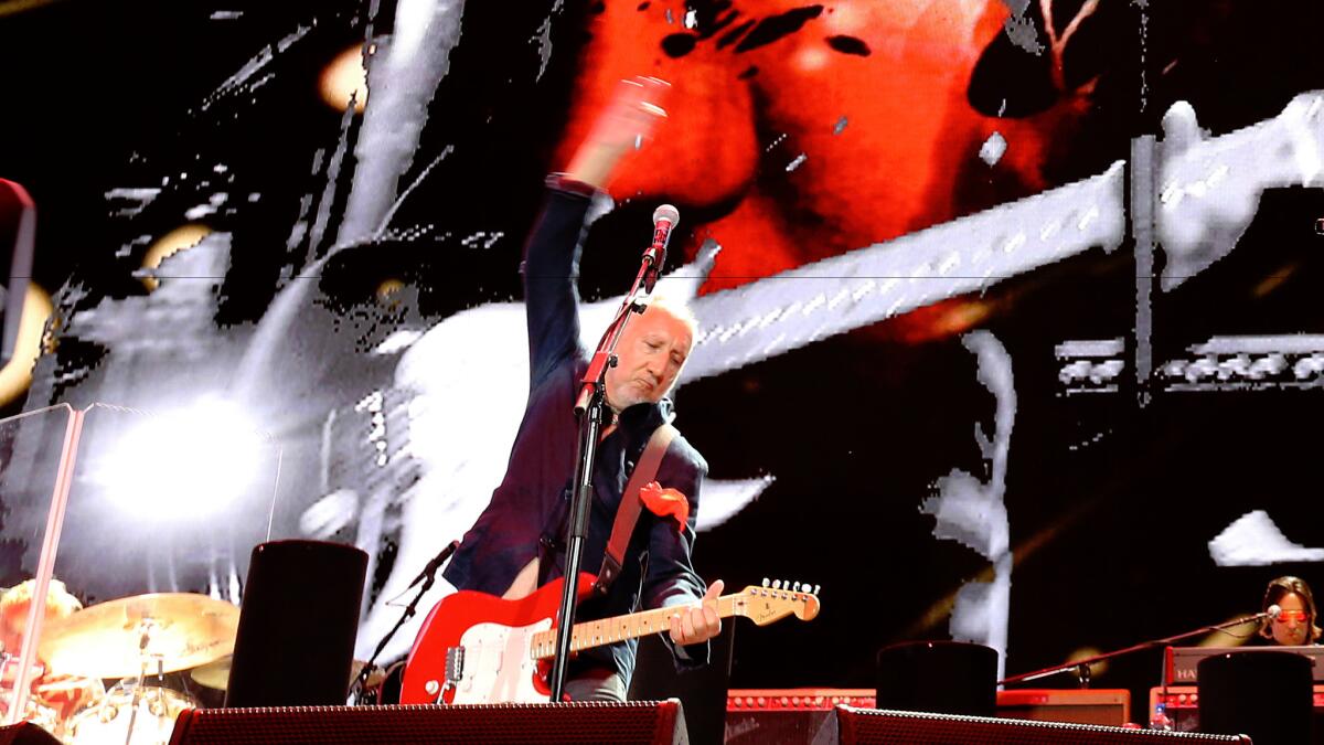 Pete Townsend strums in his trademark windmill style while performing with the Who during weekend 2 of Desert Trip in Indio on Sunday.
