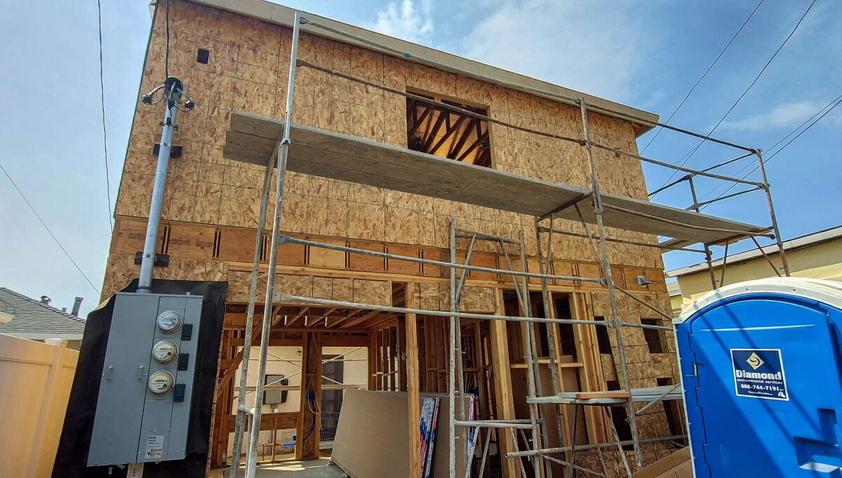 A two-story accessory dwelling unit, or "granny flat," is pictured under construction in Ocean Beach in September 2021.