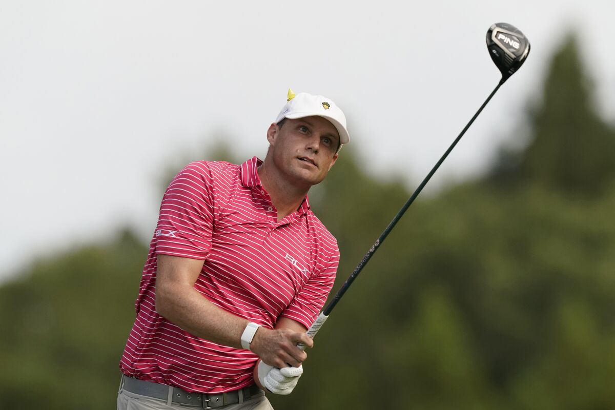 Nick Watney watches his drive off the 18th hole during the final round of the Sanderson Farms Championship golf tournament in Jackson, Miss., Sunday, Oct. 3, 2021. (AP Photo/Rogelio V. Solis)