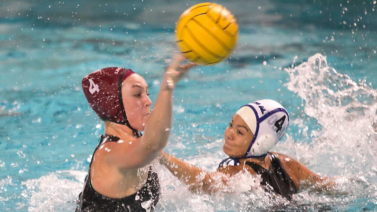 Isabel Riches (left), shown in action on Dec. 20, 2017, and the Laguna Beach High girls' water polo team will try to defend their title at the Santa Barbara Tournament of Champions.