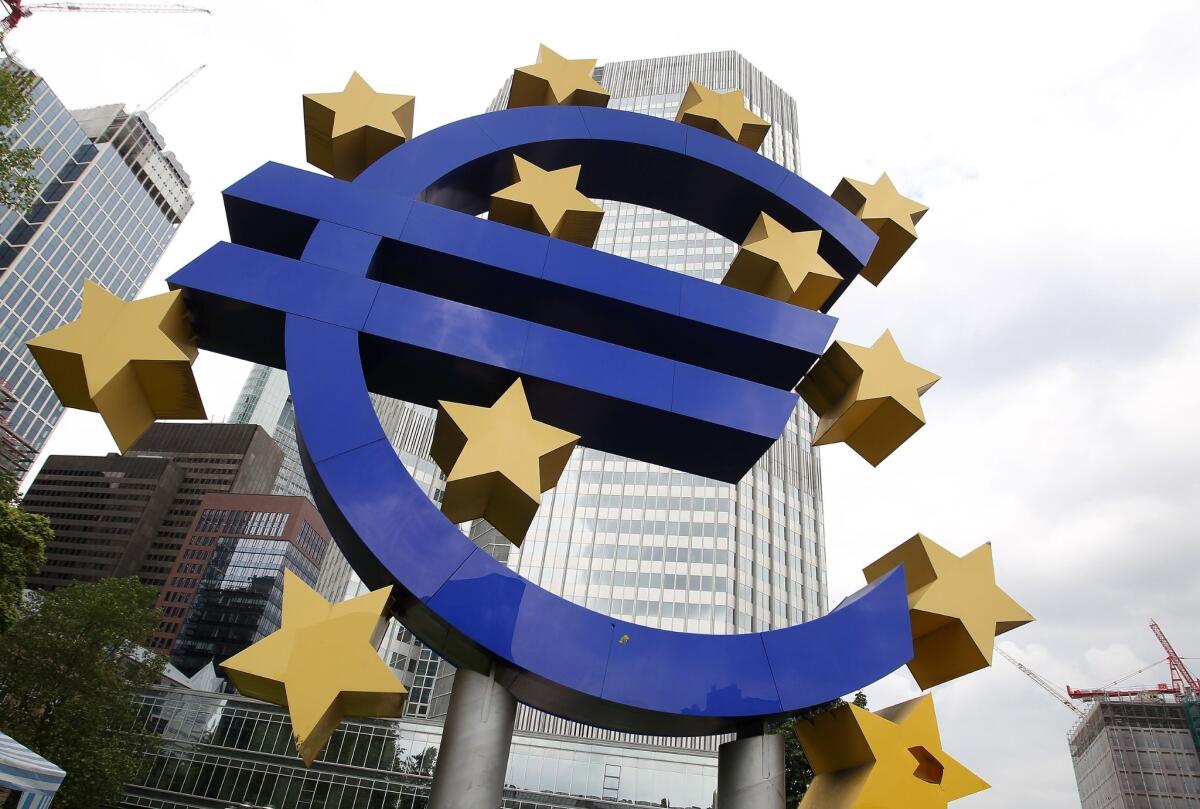 The Eurozone economy expanded by 0.3% in the second quarter of this year compared to the previous quarter, officially ending the recession that started in late 2011. Here, the euro symbol is seen in front of the European Central Bank in Frankfurt, Germany.
