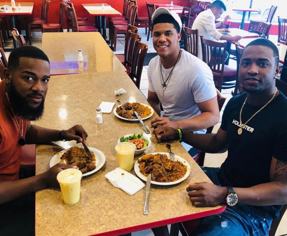 From left, the Nationals' Wander Suero, Juan Soto and Victor Robles eat at Los Hermanos in Washington, D.C.