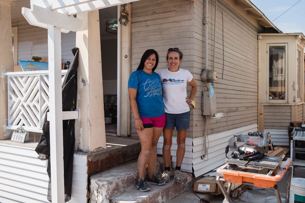 Ruth Haller and Pamela Macias, co-founders of Girls With Power Tools, pose for a photo.