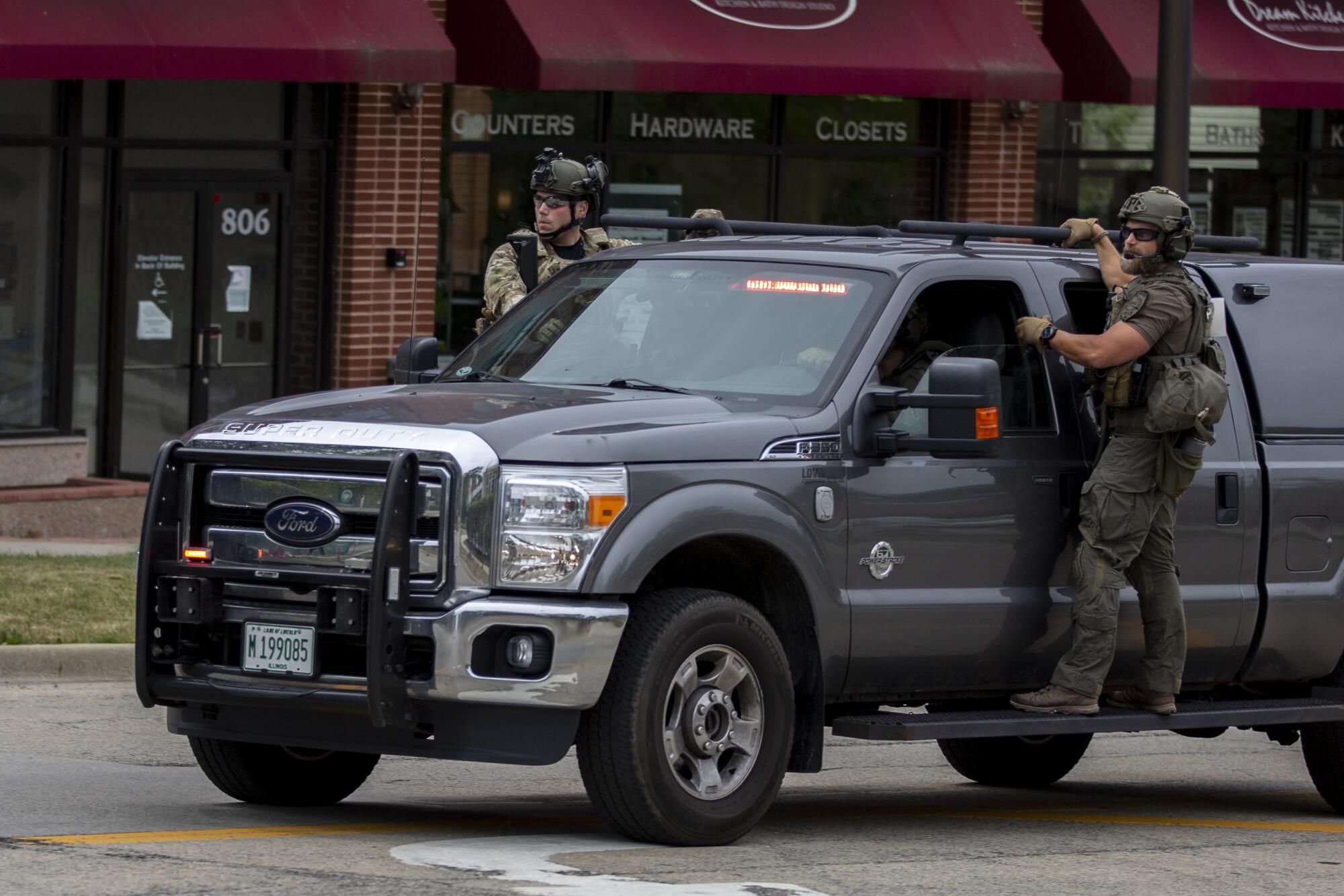 Police in Highland Park after the shooting.