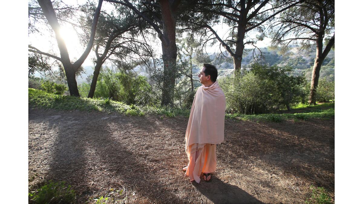 Swami Dhyanayogananda walks to view the sunset at the Trabuco Canyon Monastery.