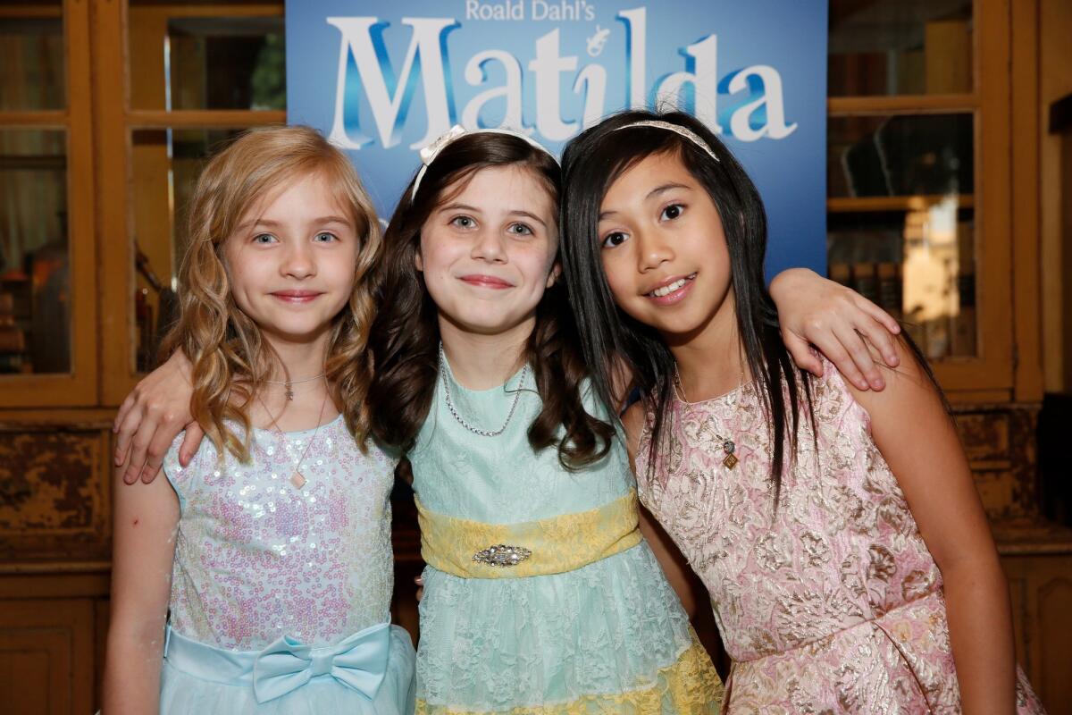 The Matildas -- Mabel Tyler, left, Mia Sinclair Jenness and Gabby Gutierrez -- pose during the party for the opening night performance of "Matilda the Musical" at Center Theatre Group/Ahmanson Theatre.