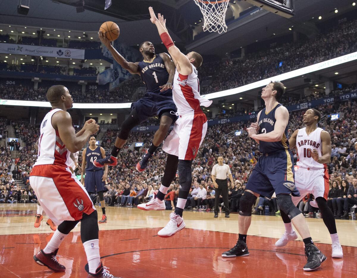 Pelicans guard Tyreke Evans attempts a shot in the middle of the lane against the Raptors Sunday night. Evans later made the game-winning basket with less than two seconds remaining.