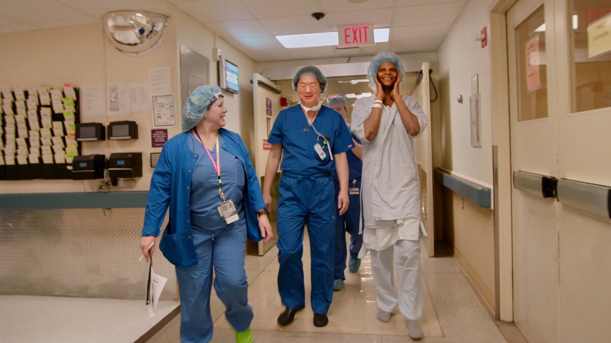 Dr. Jess Ting, center, and patient Mahogany, right, in the documentary "Born to Be."