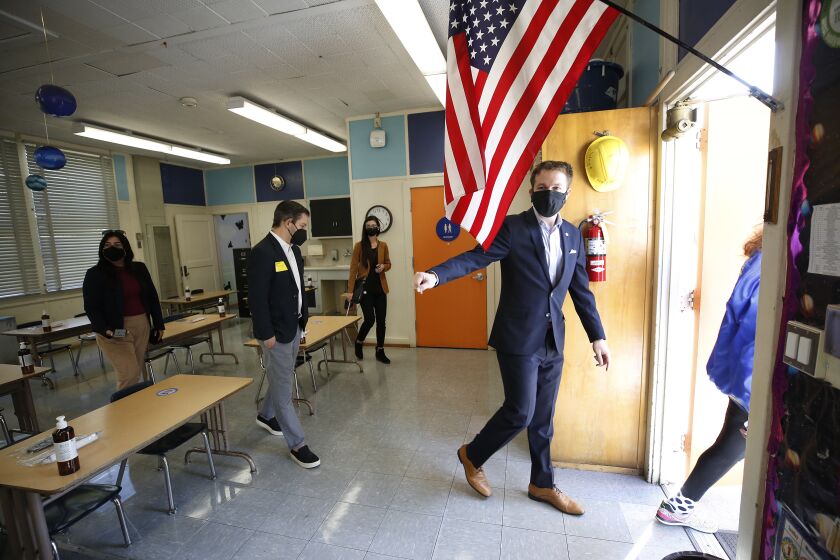 WEST HOLLYWOOD, CA - MARCH 18: Los Angeles Unified School District (LAUSD) Board Member Nick Melvoin, representing District 4 visits West Hollywood Elementary School and various other schools in his district do an official check on preparations for reopening. The walking tour included the principal, Dr. Elizabeth Lehmann, LAUSD officials, a parent, West Hollywood Mayor Lindsay Horvath and Franny Parrish, with (CSEA), which represents school clerical workers and library aides, as they viewed modifications made to the school with COVID-19 considerations. West Hollywood Elementary School on Thursday, March 18, 2021 in West Hollywood, CA. (Al Seib / Los Angeles Times).