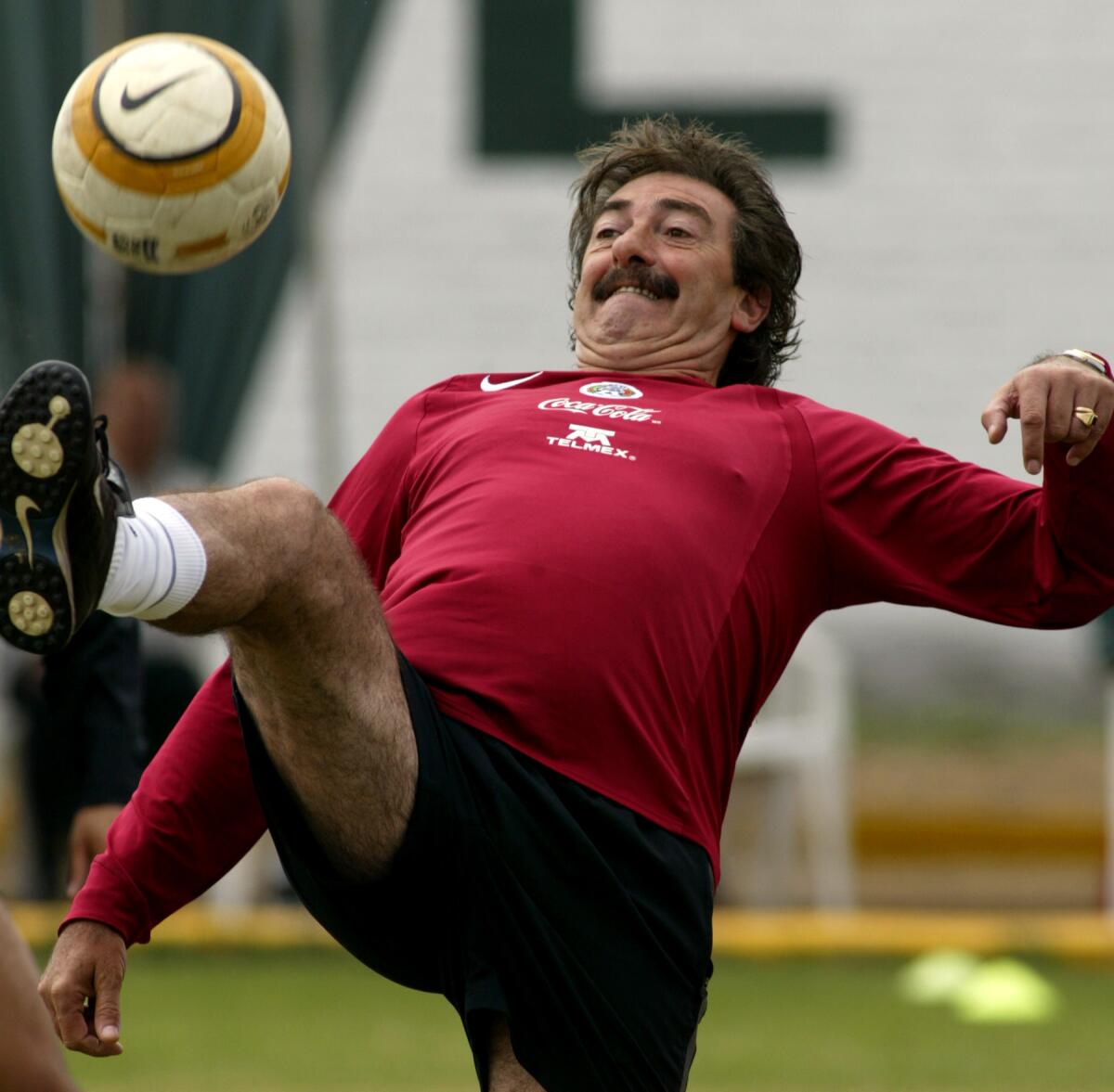 Mexico's coach Ricardo Lavolpe plays with the ball, Wednesday, July 14, 2004during a training session in Chiclayo, Peru. Mexico will play on Sunday its quarterfinal game of the Copa America.