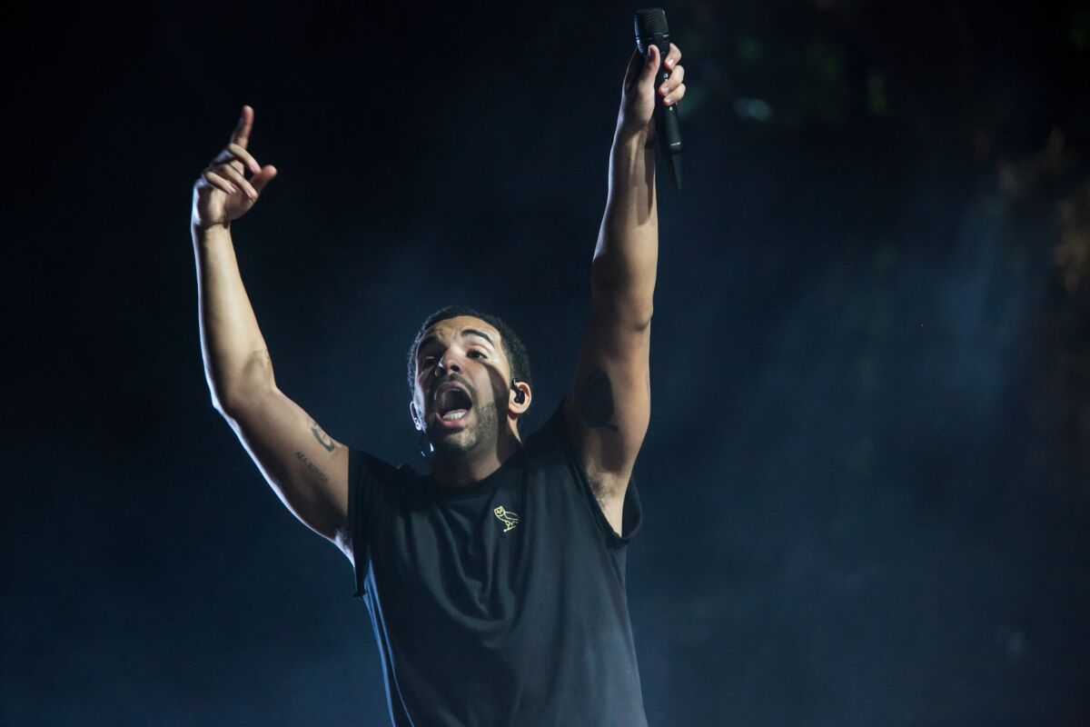 Drake performs on the main stage during Day 3 of the Coachella Valley Music and Arts Festival in Indio on April 12.