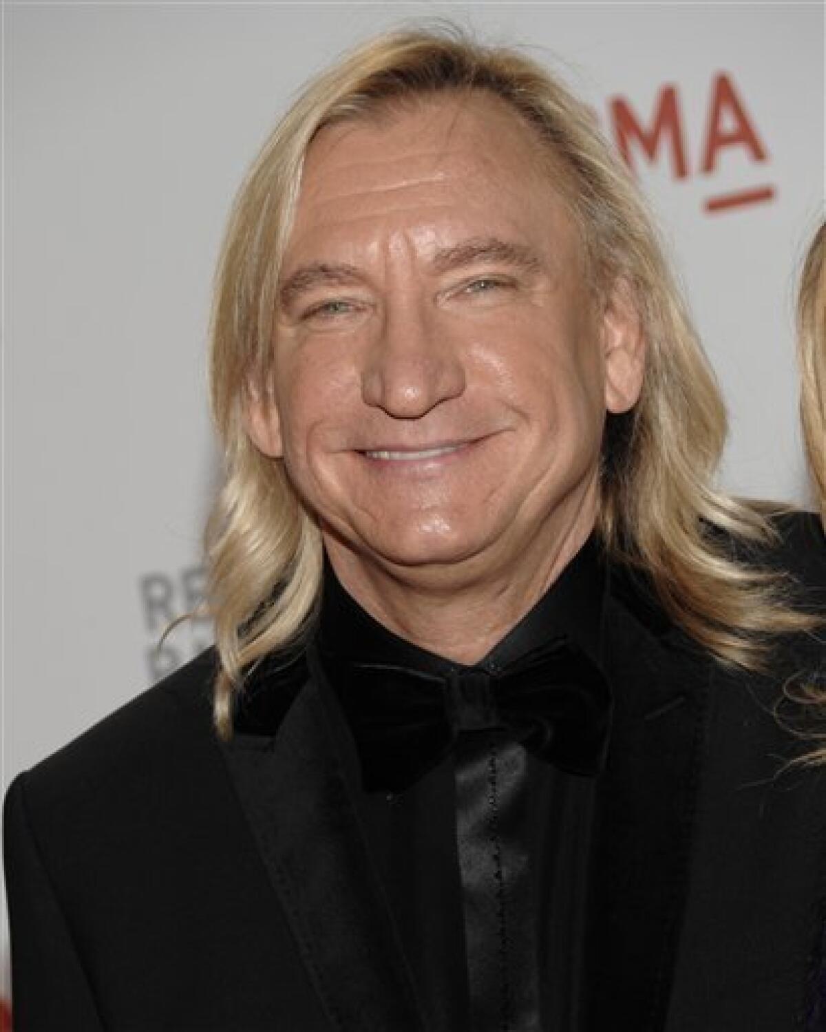 Rock and Roll Hall of Famer Joe Walsh, a former Encinitas resident, returns to San Diego for a sold-out Feb. 2 show at the Belly Up. "Analog Man," his first new album in two decades, is due out later this year. (AP Photo/Dan Steinberg) — AP