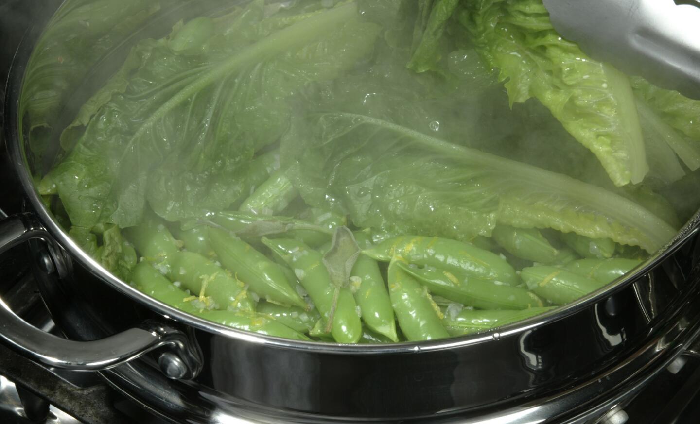 Sugar snap peas steamed in lettuce leaves