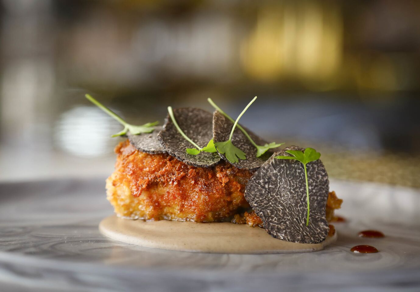 One of the new dishes at Jeune et Jolie restaurant in Carlsbad: Ris De Veau, with veal sweetbread, celery root, onion andblack truffle.