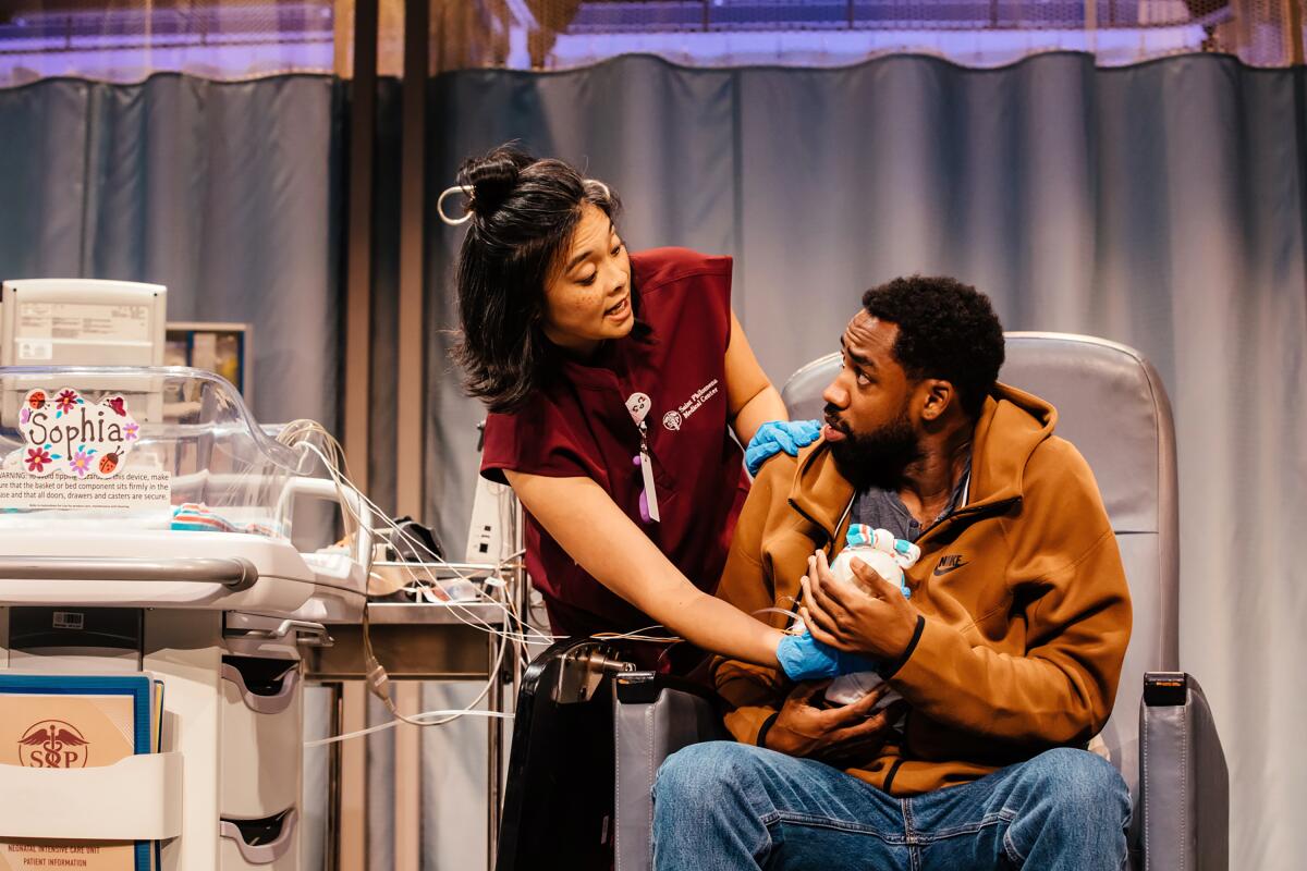 Tiffany Villarin, left, and Maurice Williams in "tiny father" at Geffen Playhouse.