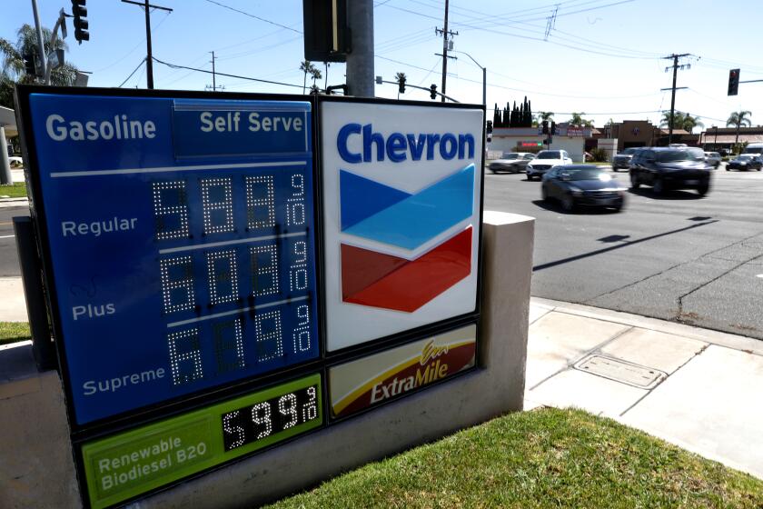 TUSTIN, CA - MARCH 08: Chevron gas station along 17th Street and Carroll on Tuesday, March 8, 2022 in Tustin, CA. The average price of a gallon of self-serve regular gasoline in Los Angeles County rose 8.9 cents today, its 30th record in 32 days. In Orange County average price rose 8.8 cents, its 29th record in 34 days. (Gary Coronado / Los Angeles Times)