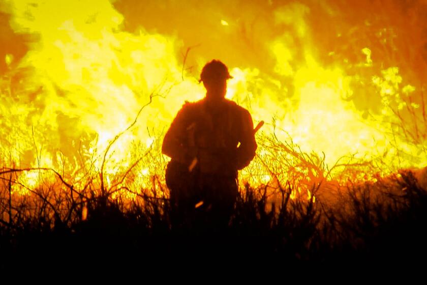 Firefighters struggle to contain the Alisal Fire, which has burned 6,000 acres in less than a day, shutting down the 101 Freeway in that area.