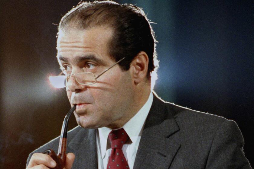 In this Aug. 6, 1986 file photo, Supreme Court Justice nominee Antonin Scalia attends a Senate Judiciary Committee during his confirmation hearings in Washington.