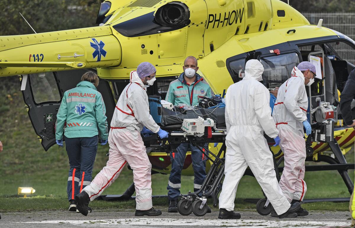 A COVID-19 patient from the Netherlands arrives for treatment by helicopter 