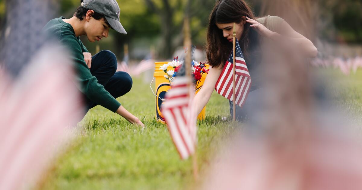 Loved ones attend to graves at Los Angeles National Cemetery ahead of Memorial Day Loved ones attend to graves at Los Angeles National Cemetery ahead of Memorial Day