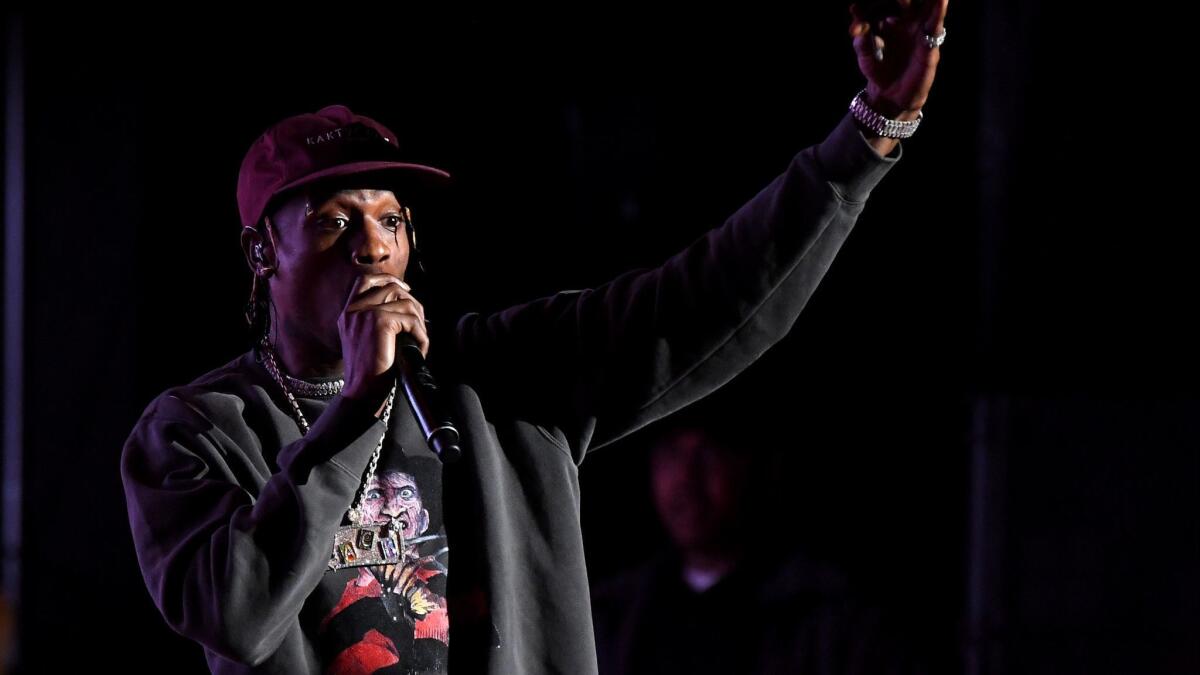 Rapper Travis Scott performs during a memorial concert for Mac Miller at the Greek Theatre on Wednesday.