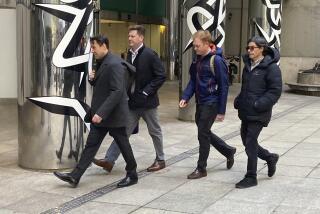 Major League Baseball officials arrive at the MLB Players Assn. office for labor negotiations.