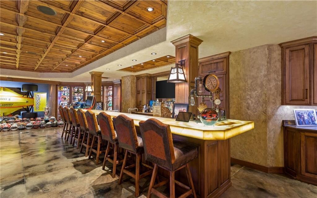 The 415-acre compound includes a 20,000-square-foot home and hunting reserve loaded with elk and deer.