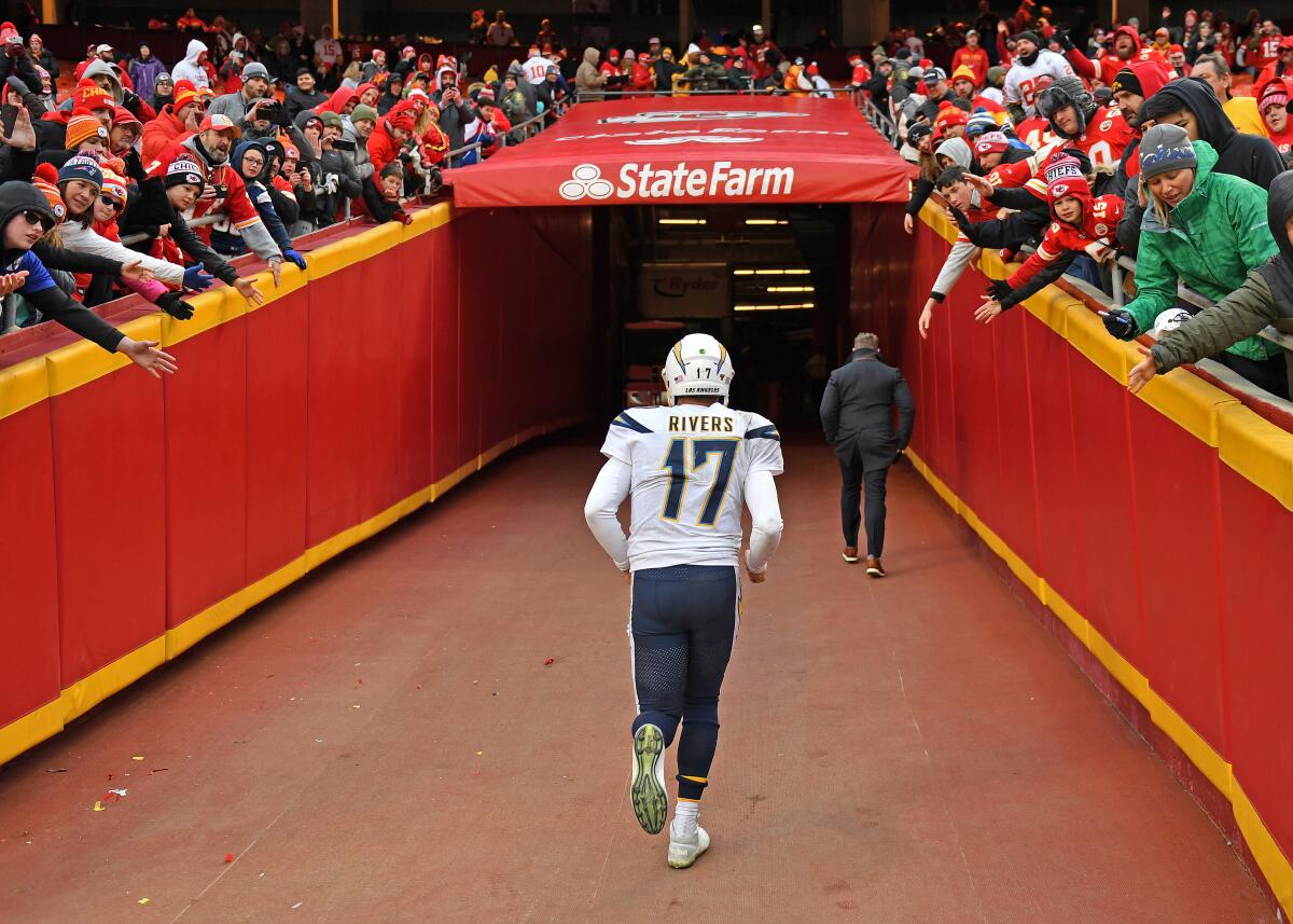 Philip Rivers jogs off the field after a loss to the Kansas City Chiefs in the Chargers' season finale Dec. 29.