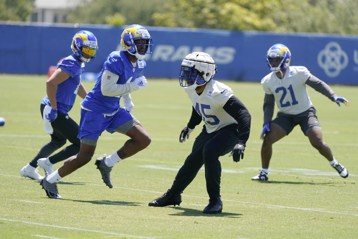  Rams linebacker Bobby Wagner (45) gets in position against crossing routes during organized training activities Thursday.