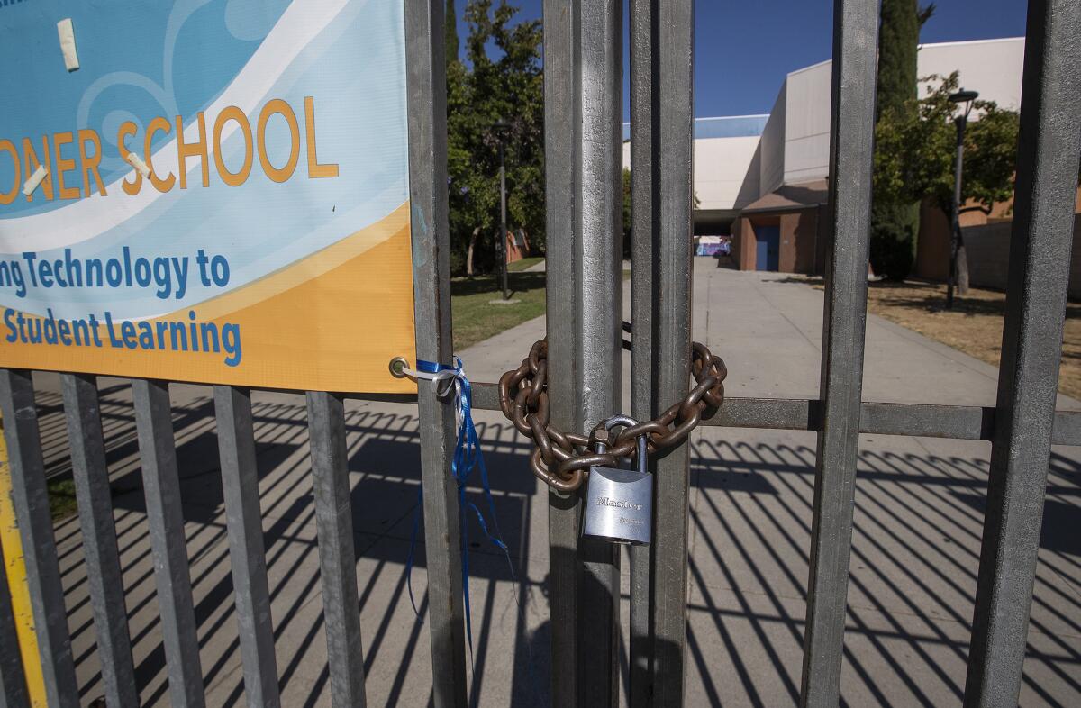 Locked gate in front of Los Angeles High School on Rimpau Bvd. in Los Angeles